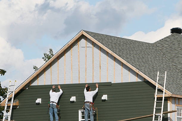 Professional Siding technician working in Port Washington, OH